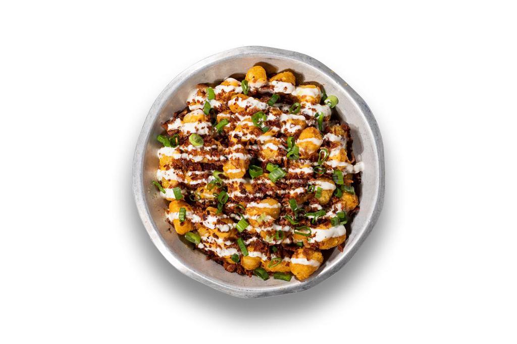 Loaded Tater Tots · Fat Tire® beer cheese, bacon, homemade ranch, scallions