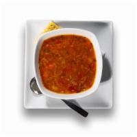 Maryland Crab Soup · Tomato broth with blue crab, onions, potatoes, peppers, green beans and Old Bay®