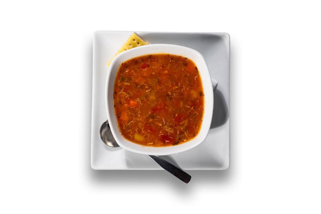Maryland Crab Soup · Tomato broth with blue crab, onions, potatoes, peppers, green beans and Old Bay®