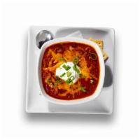 Hearty Chili · Mild chili with beans, served with cheddar cheese, sour cream, scallions