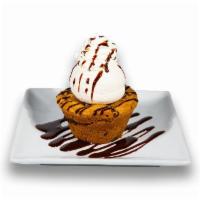 Cookie Lava Sundae · Huge chocolate chip cookie with warm chocolate fudge center, topped with vanilla ice cream a...