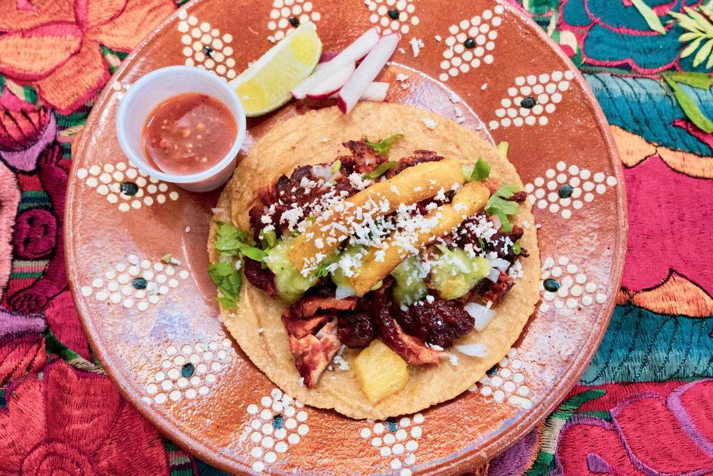 Tacos Al Pastor · Marinated Pork with pineapple.