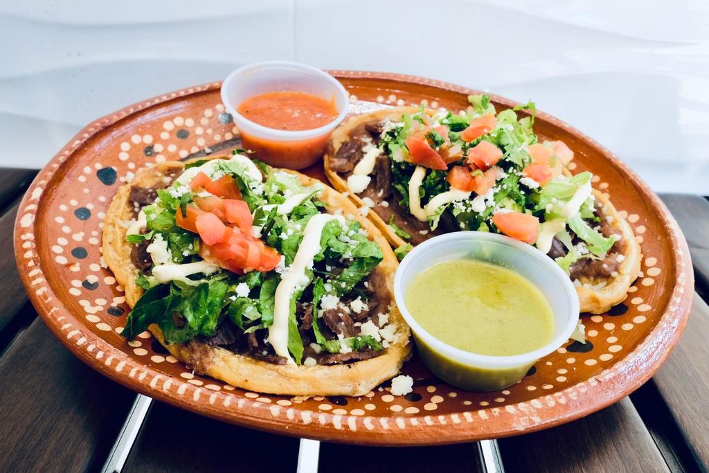 Serrano’s Huaraches · Fried masa dough with a refried pinto beans spread, topped with pico de gallo, crema and cotija cheese. Add any protein $3.99