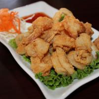 1. Koo Ruk · Fried shrimp and calamari. Deep-fried shrimp and calamari served with sweet chili sauce.