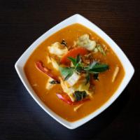 39. Gang Dang · Red curry. Gluten-free. Choice of spice level. Choice of style. Red curry with eggplants, re...