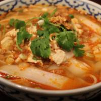 49. Kao Soy Laos Noodle with Shrimp · Gluten-free. Laos style pork broth soup served with wide noodles, shrimp, bean sprouts, and ...
