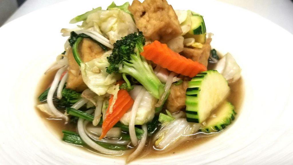 73. Pad Pak Ruam (Mixed Vegetables) · Choice of style. Stir-fried mixed vegetables; broccoli, carrots, cabbage, bean sprouts, mushroom, and spinach.