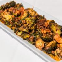 Brussel Sprouts · Tossed with bacon, honey, sriracha, truffle salt and lime glaze. Gluten free.