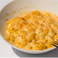 F and P House Mac and Cheese · Cavatappi noodles tossed with our house mac cheese biend oven finished with toasted Parmesan...