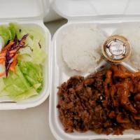 Beef and Spicy Pork Combination · Served with rice and salad.