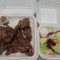 Gal Bi Plate · Beef short ribs. Served with rice and salad.