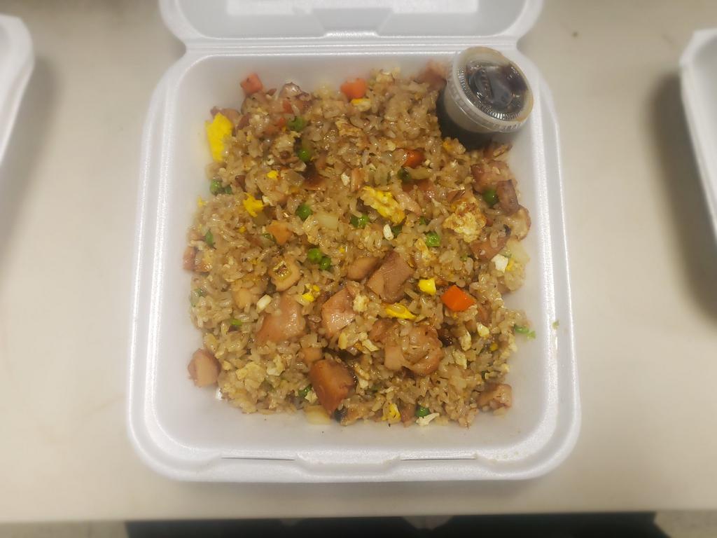 Chicken Fried Rice · Contains peas, carrots, onion and corn.