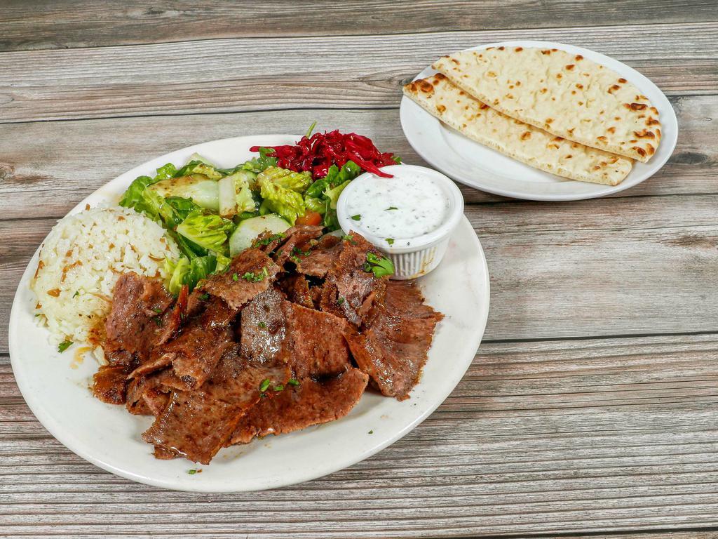 Lamb and Beef Gyro Plate · Slow-cooked sliced marinated lamb and beef. Served with salad, rice, and pita bread.