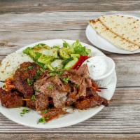 Mediterranean Combo Plate · Lamb and beef gyros, chicken kebab, shish kebab, and kofte. Served with salad, rice, and pit...