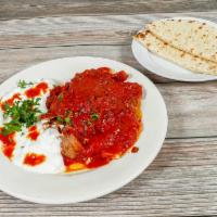 Alexander Kebab Plate (Iskender) · Seasoned thin-sliced beef and lamb over bread cubes with tomato sauce, yogurt, and melted bu...