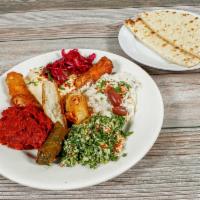 Appetizer Combo Plate · Hummus, baba ghanoush, tabouleh, ezme, cigarette borek, spanakopita, and red cabbage. Served...
