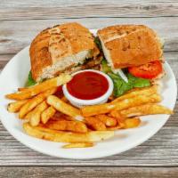Chicken Sub · Marinated sliced chicken. Served with lettuce, tomato, onion, provolone, mayo, mustard and f...
