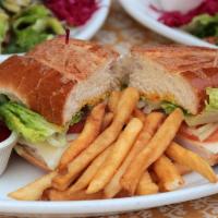 Mediterranean Burger Sub · Ground sirloin, fresh herbs and mayonnaise. Served with lettuce, tomato, onion, provolone, m...