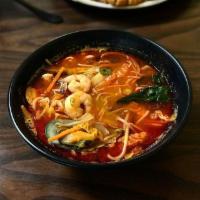 Spicy Seafood Pho · Beef bone broth with rice noodles and a spicy kick, topped with a seafood medley.