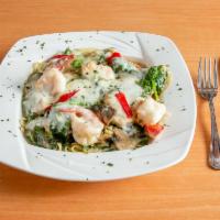 Chicken Shrimp Primo Saute · Sauteed chicken breast with mushrooms, spinach, garlic, herbs and white wine sauce topped wi...