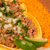 Pork Street Tacos · Folded tortilla with a variety of fillings such as meat or beans.