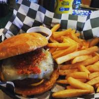 Smoochie Burger · Raw onion, pepper jack cheese, red pepper relish, ketchup and mustard. 8 oz. hand pressed 80...