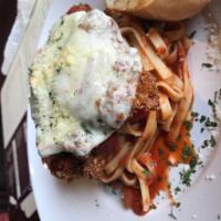 Chicken Parm · Italian seasoned chicken breast breaded and lightly fried, served with a generous helping of...