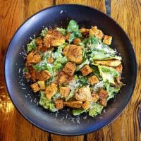 Chipotle Caesar Salad · Romaine lettuce, corn bread croutons, Parmesan cheese, chipotle Caesar dressing. Add chicken...