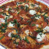 Margherita Pizza · Light tomato sauce, slice tomato, Buffalo mozzarella, basil, oregano, and olive oil.