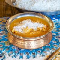 Goa Chicken Curry a la Carte · Chicken pieces cooked with medium or hot sauce with ginger and garlic.  Served with basmati ...