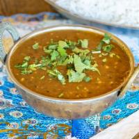 Dal Makhini a la Carte · Kidney beans and whole red lentil curry. Served with basmati rice. Gluten-free. Nut-free. Ve...