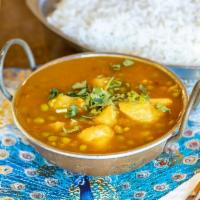 Aloo Mutter a la Carte · Mildly spiced potato and green pea curry. Served with basmati rice. Gluten-free. Nut-free. V...