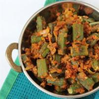 Bhindi Masala a la Carte · Spices with whole okras cooked with ginger and garlic. Served with basmati rice. Gluten-free...