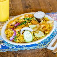 Shrimp Biryani · Basmati rice with shrimp and spices. Served with raita and curry sauce. Gluten-free. Nut-free.