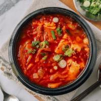 Kimchi Stew 32 oz · it called 'Kimchi Jjigae'
contains: Pork, Cabbage Kimchi, Tofu, Onions, Scallion.

Serve wit...