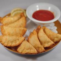 Crab Puff (8 pcs) · fried wonton filled with krab meat and cream cheese served with sweet and sour sauce