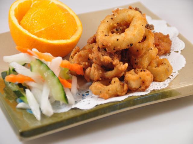 Spicy Calamari · gentle fried calamari served with spicy sauce on the side