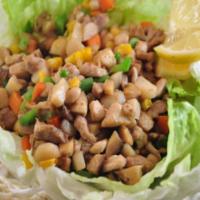 Chicken Lettuce Wrap · sauced chicken and vegetables (mushroom, jicama, celery, peas, white onion) served with lett...