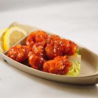 Sesame Chicken Appetizer · battered fried chicken nugget with sesame sauce and sesame seed on top