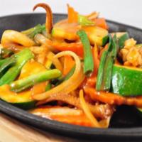 Spicy Squid Teppenyaki · Spicy squid with zucchini, celery, carrot, baby corn, red pepper, green pepper, green onion,...