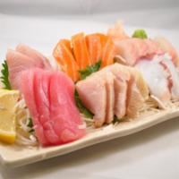 Large Sashimi (18 pcs) · sashimi (4 pcs salmon, 4 pcs white tuna, 4 pcs tilapia, 3 pcs tuna, 3 pcs yellow tail)  