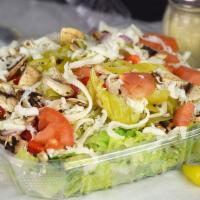 Green Salad · Fresh Romaine lettuce with red onions, bell peppers, Roma tomatoes, mushrooms and pepperonci...
