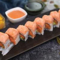 Bayshore Roll · Spicy kani, avocado and spicy salmon on top with sweet plum sauce. Wrapped with seaweed nori.