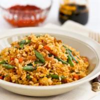 Spicy Basil Fried Rice · Fresh basil leaves, bell pepper, egg, onion, chili and garlic. Spicy.