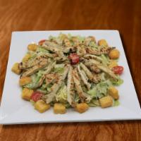 Caesar Salad · Green salad with Caesar dressing and cheese. 