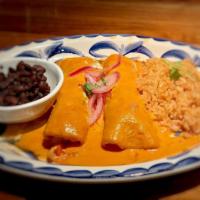Enchiladas Habanero · Two corn tortillas filled with your choice of chicken or pork carnitas then finished with a ...