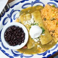 Enchiladas Guadalajara · Two corn tortillas filled with sautéed chicken, mushrooms, corn, pico de gallo, spinach, and...