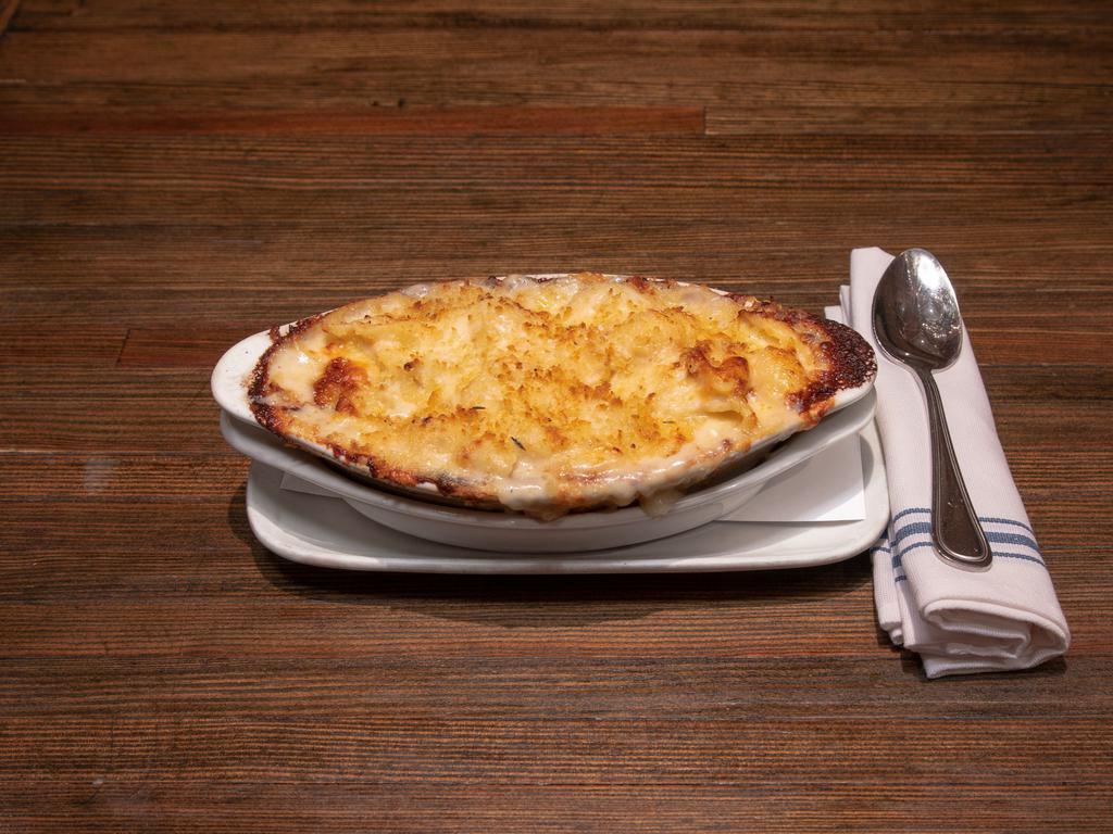Mac and Cheese · Gruyere, cheddar, fontina val d'aosta, Parmigiano, garlic and breadcrumbs.