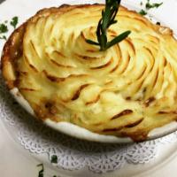 Shepherd's Pie · Seasoned ground beef with vegetables in a homemade gravy topped with mashed potatoes then ba...