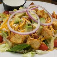 Joe’s Garden Salad · Lettuce, bacon, avocado, tomato, red onion, cheese, house made croutons, with choice of dres...